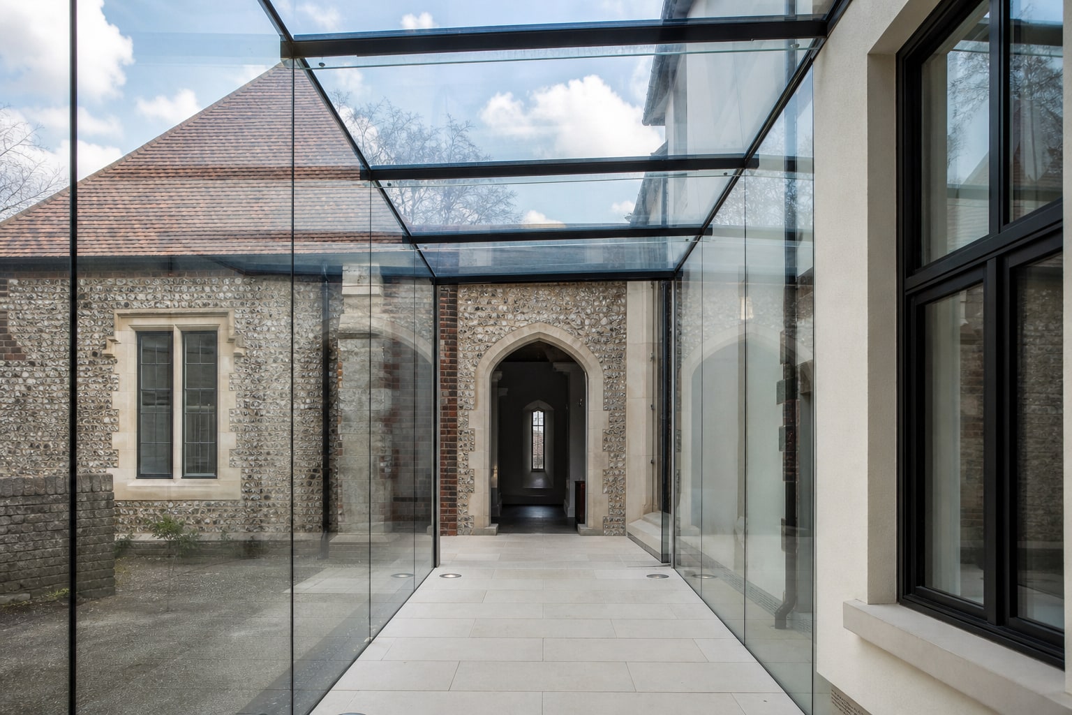 Frameless glass link corridor in Bishop's Stortford