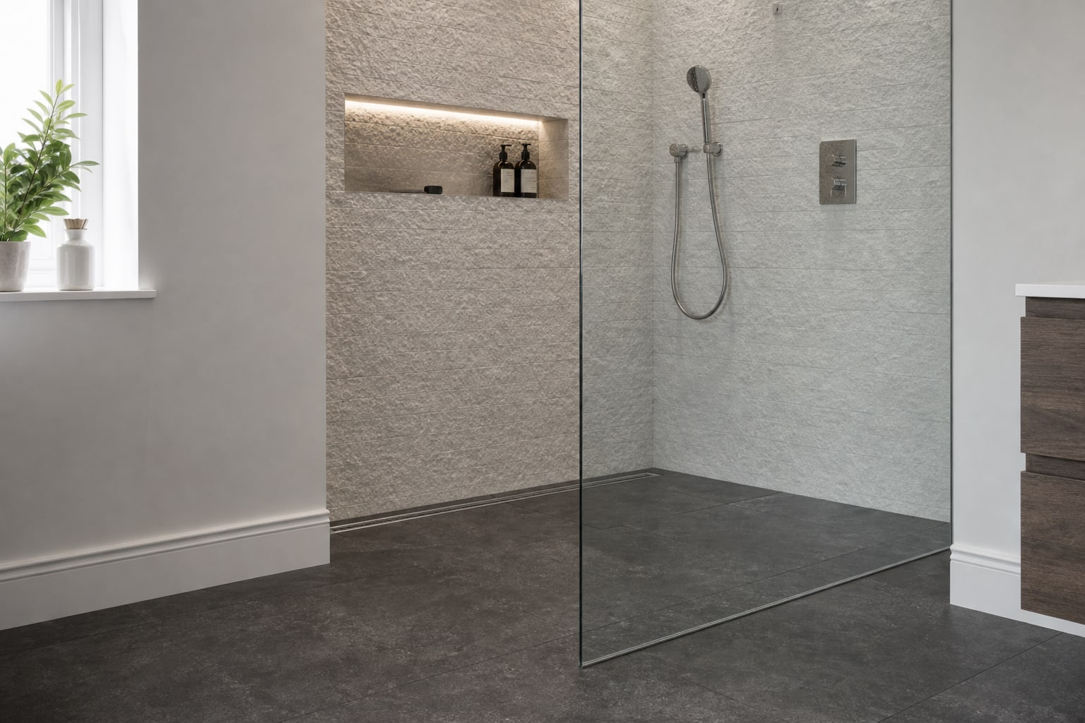 Floor drain and glass-to-tile junction