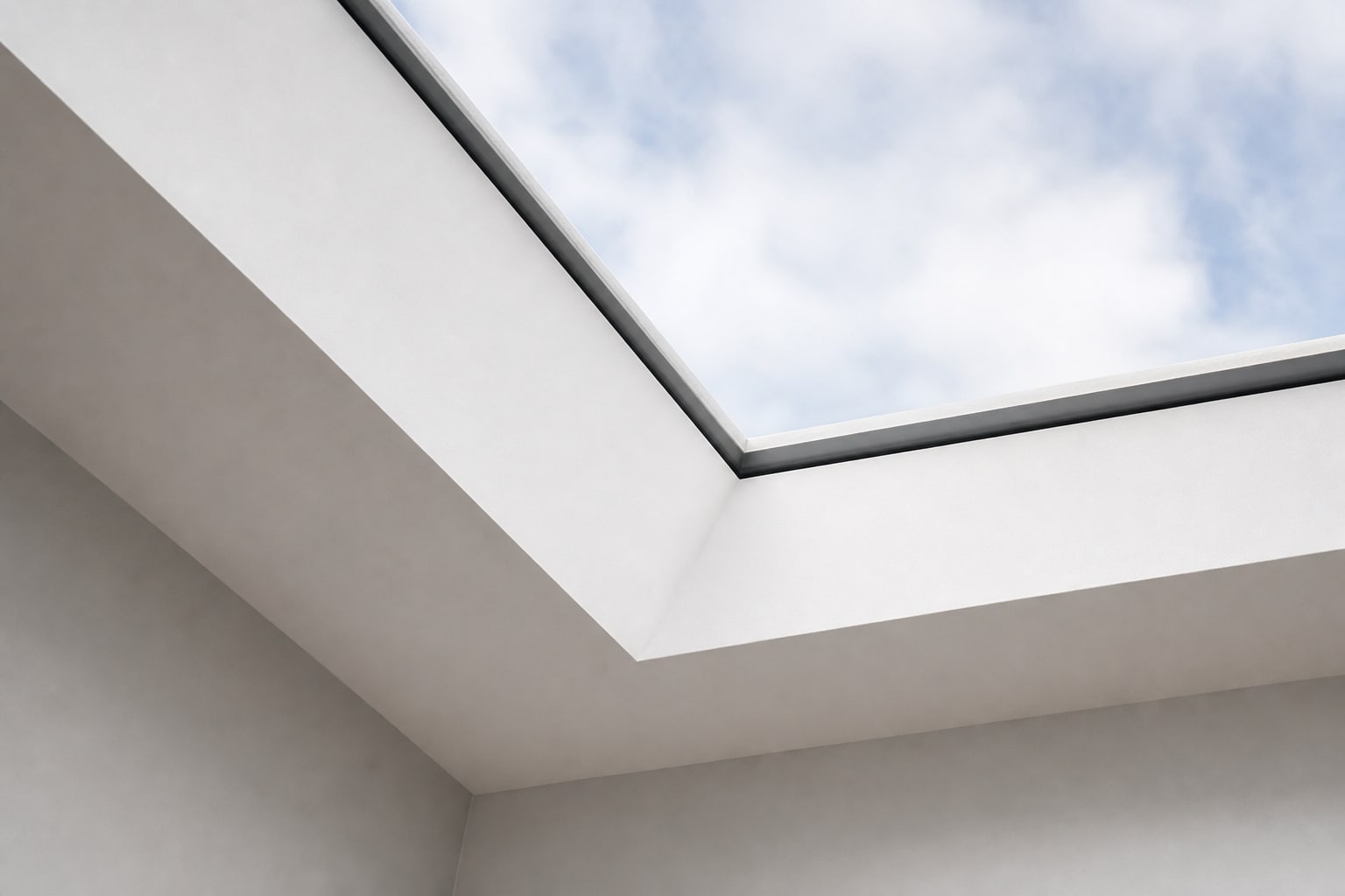 Skylight frame meeting the plaster ceiling