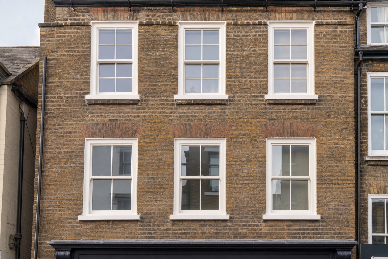 White timber sash windows on a Ware period townhouse