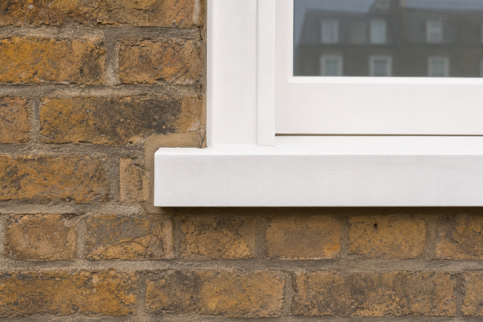 Window cill and brick junction detail