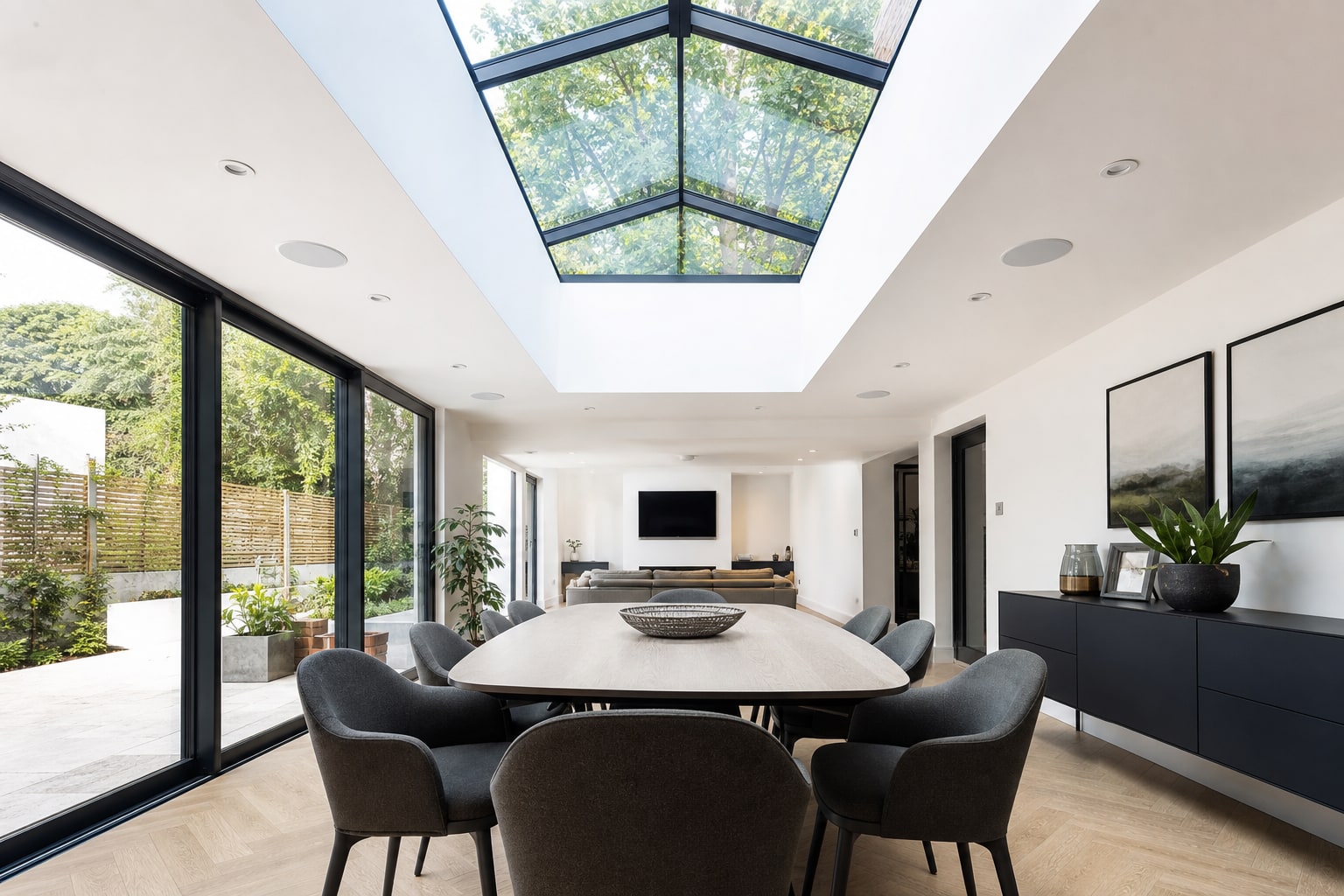 Black-framed roof lantern over a Watford dining and living space